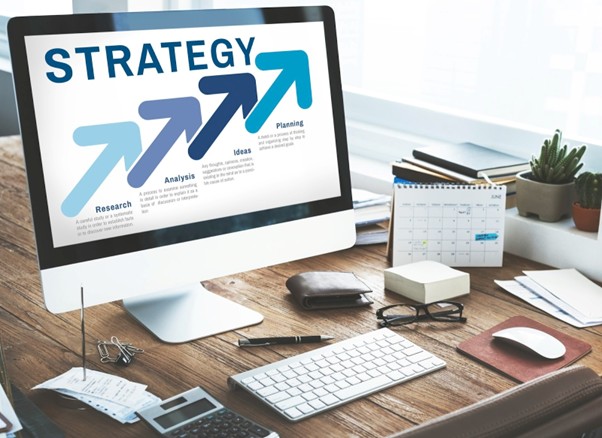  Strategy screen with growth arrows for scaling Facebook ads campaigns.