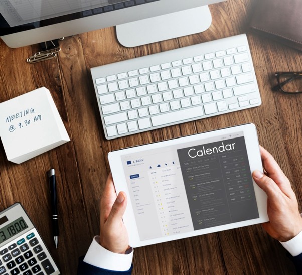 Tablet calendar planner representing content marketing for small businesses.

