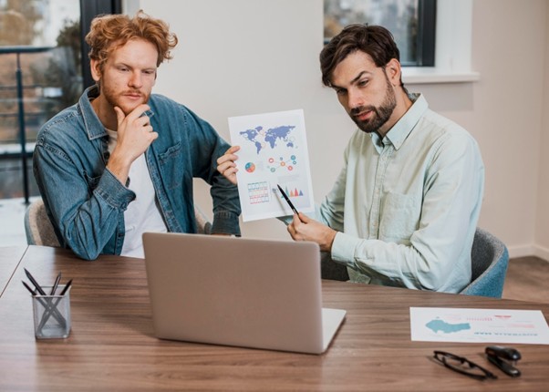 SEO audit process to fix SEO mistakes using data analysis and performance tracking on a laptop.